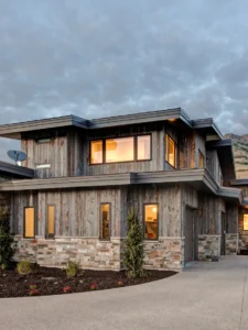 Exterior view of Big Fork Estate in The Highlands community, a custom home built by Big Canyon Homes in Eden, UT, designed by Mark Design Inc.