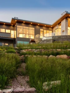Exterior view of Elk Valley House, a custom home built by Big Canyon Homes in Eden, UT, with architecture by Ray Bertoldi.