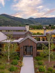 Exterior view of Flair Homestead in the Snyderville community, a custom home built by Big Canyon Homes in Park City, UT, with architecture by 4C Design Group and design by The Flairhunter.