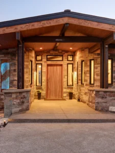 Exterior view of Hawk Landing in The Highlands community, a custom home built by Big Canyon Homes in Eden, UT, with architecture by Mark Design Inc.