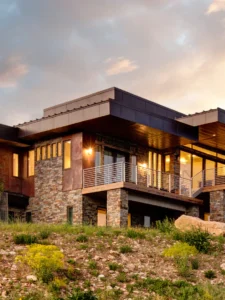Exterior view of Pantbrush Retreat in The Retreat community, a custom home built by Big Canyon Homes in Eden, UT, designed and architected by Mark Design Inc.