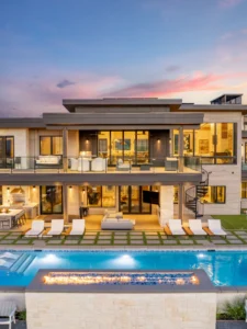 Exterior view of Skyline Estate in the Trappers Crossing community, a custom home built by Big Canyon Homes in Huntsville, UT, with architecture by Bertoldi Architects.
