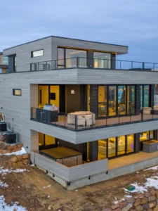 Exterior view of The Ledge in the Powder Mountain community, a custom home built by Big Canyon Homes in Eden, UT, with architecture by Bertoldi Architects.