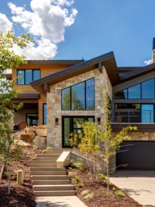 Exterior view of The Winter House in the Deer Valley community, a custom home built by Big Canyon Homes in Park City, UT, with architecture by Jonathan DeGray and design by Kara Webster, ASID & Aja Webster Interior Design.