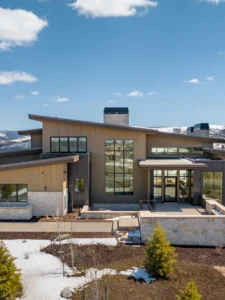 Exterior view of Whispering Meadow in the Victory Ranch community, a custom home built by Big Canyon Homes in Kamas, UT, with architecture and design by Shaw Design.